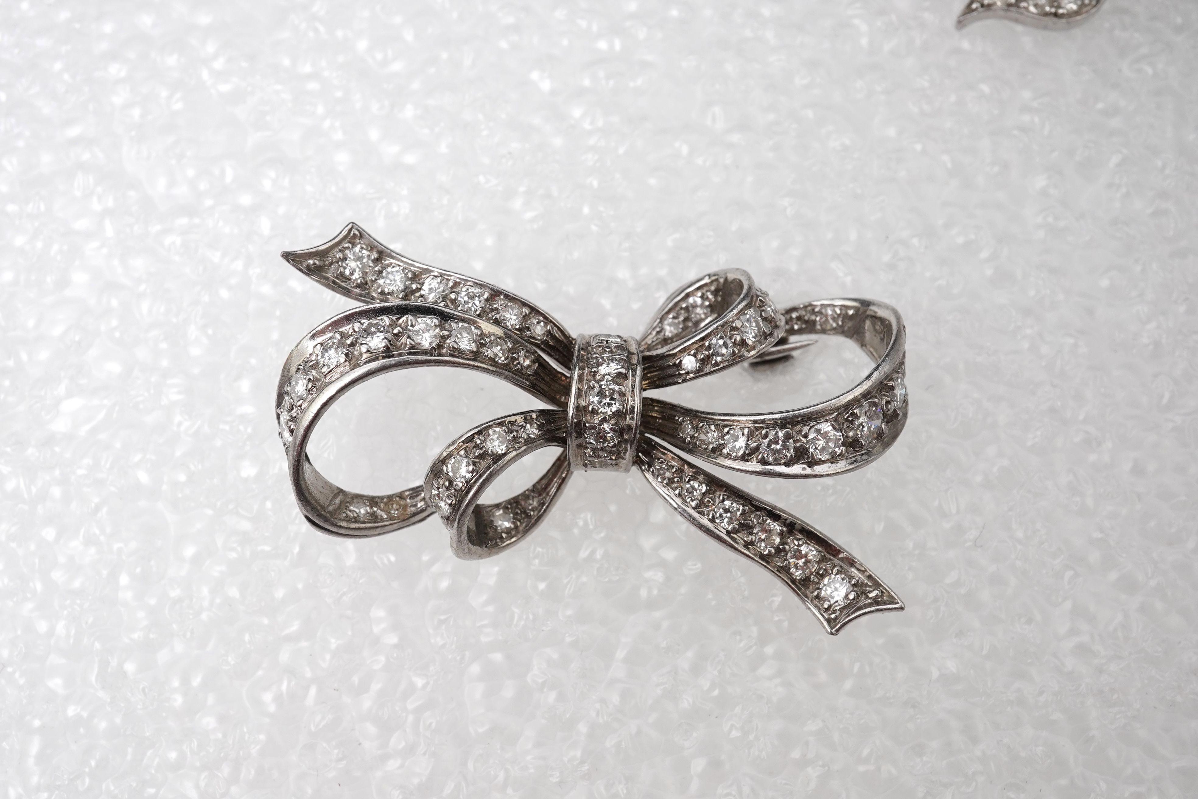 Two diamond brooches, mid 20th century